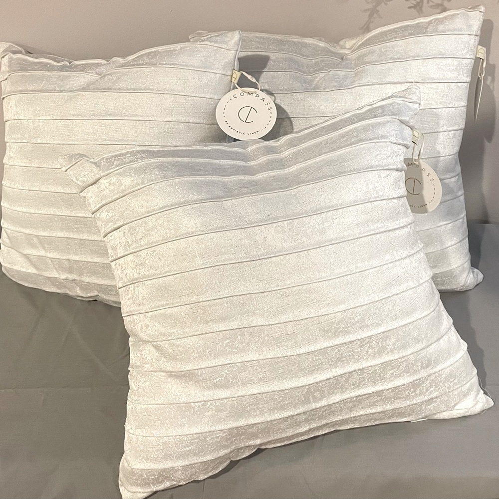 Set of 3 shimmering decorative pillows. Great decor for any room of the house.